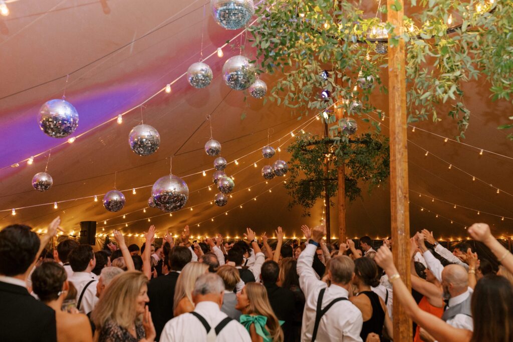 Guests on the dance floor during Martha's Vineyard tented wedding