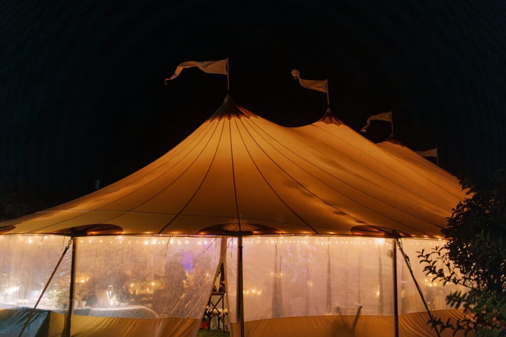 Sailcloth tent at night during rainy reception on Martha's Vineyard 