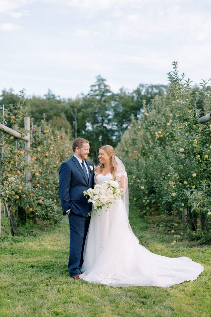 Bride and groom portrait in the orchard at The Greenery at McKenzie's Farm Wedding