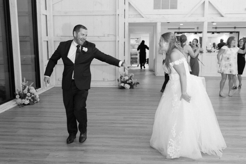 Black and white photo of bride and groom on the dance floor during New Hampshire wedding