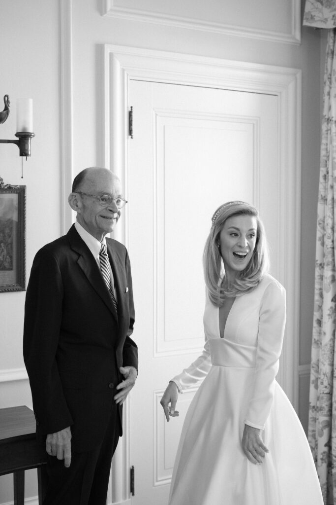 Bride and her father black and white candid portrait for Newport wedding