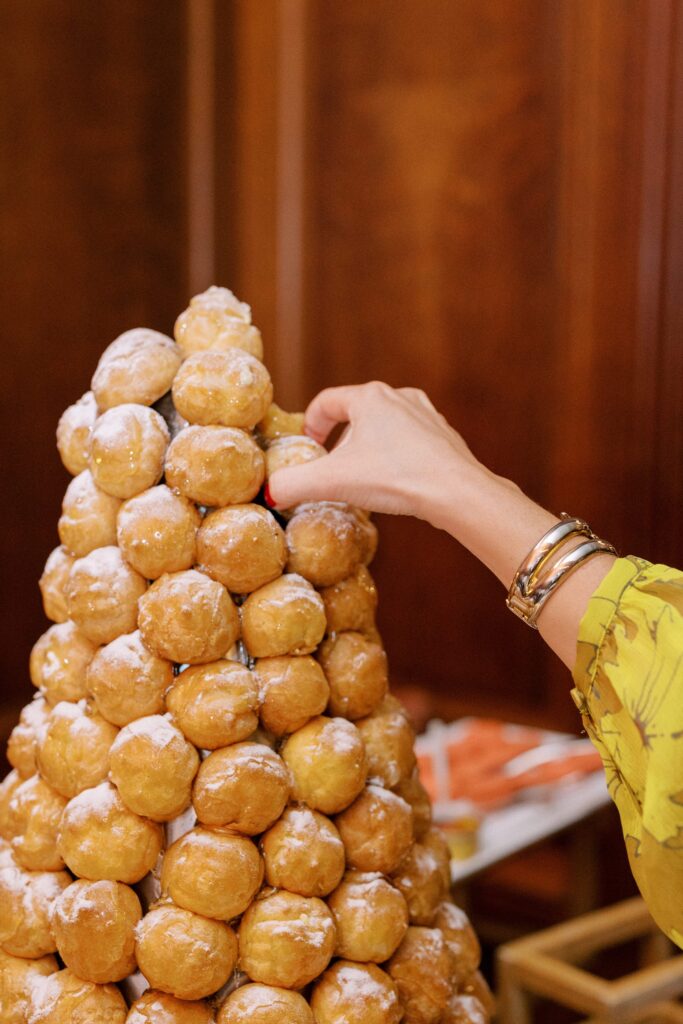 Guest taking donut from the donut tower for Newport wedding 